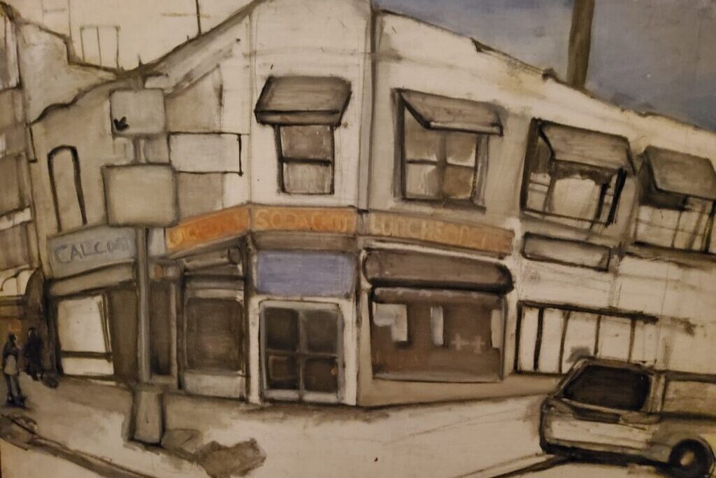 A view of a building in an urban street, with a red awning and darkened windows.